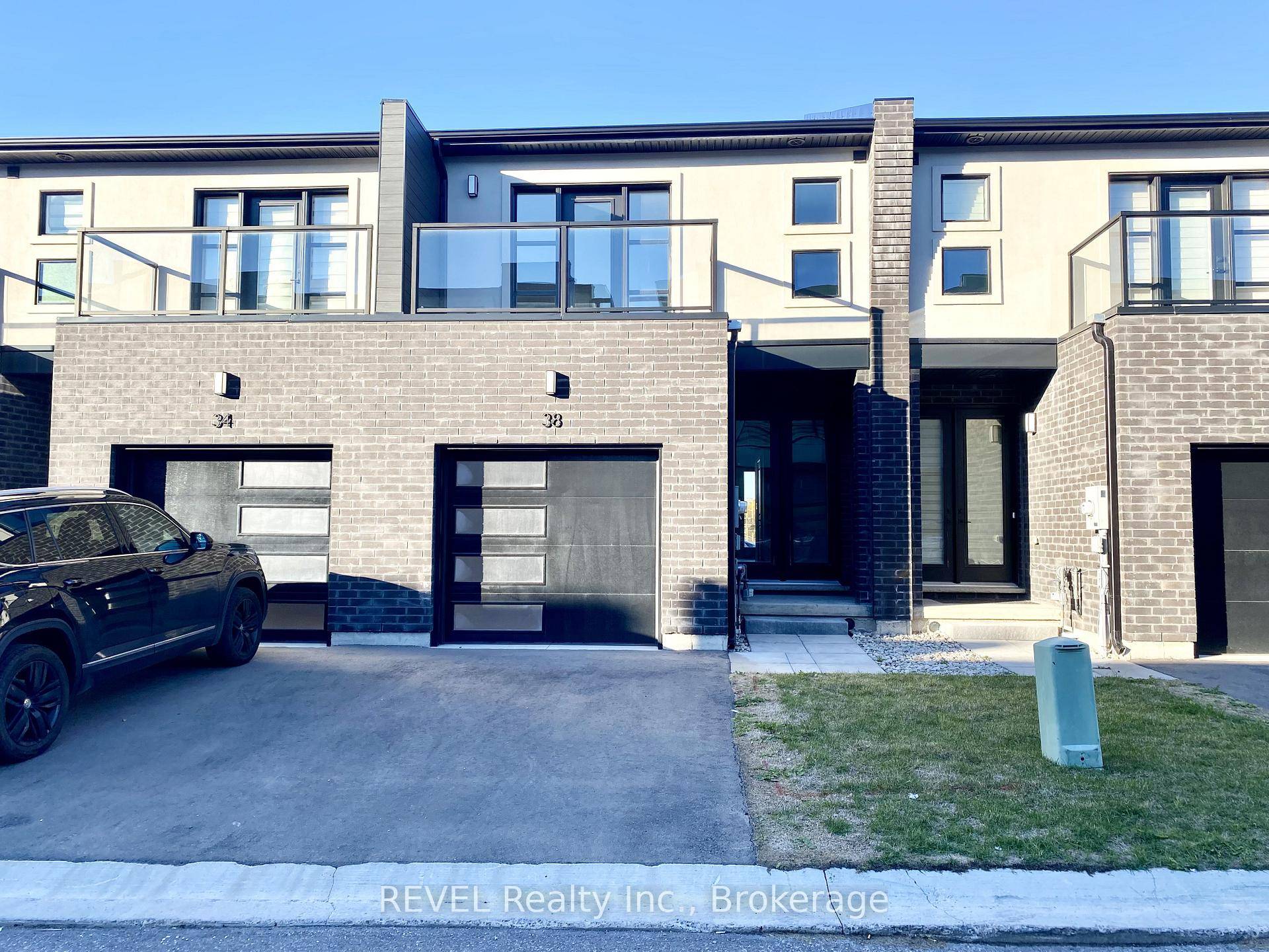Discover modern townhome living at 38 Warren Trail in Welland's.