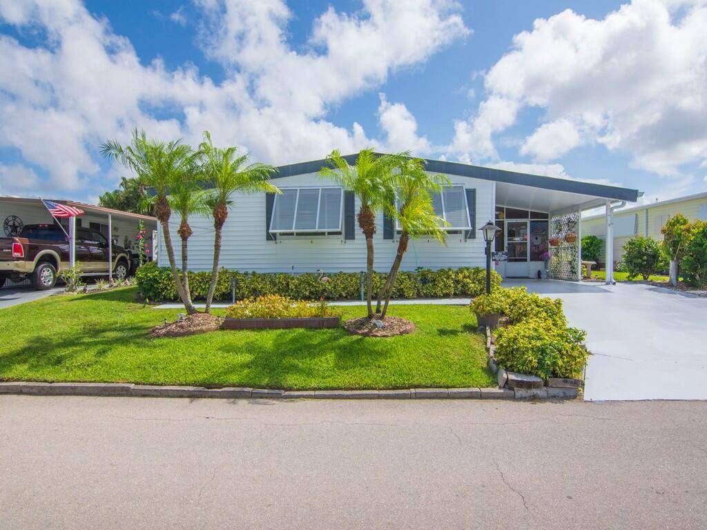 You'll love this large 2 2 mobile home located in the friendly and much sought after 55 community of Pinelake Village in Jensen Beach.