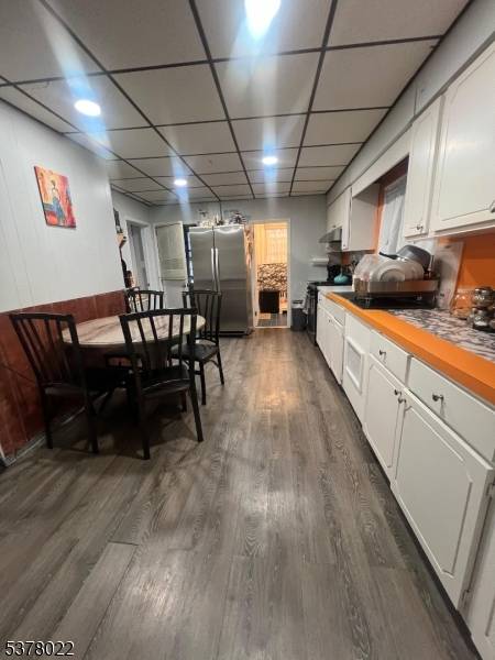 Great Opportunity in the heart of Ironbound Section This home features 2 bedrooms on the first floor and 3 bedrooms on the second floor, providing flexible living space.