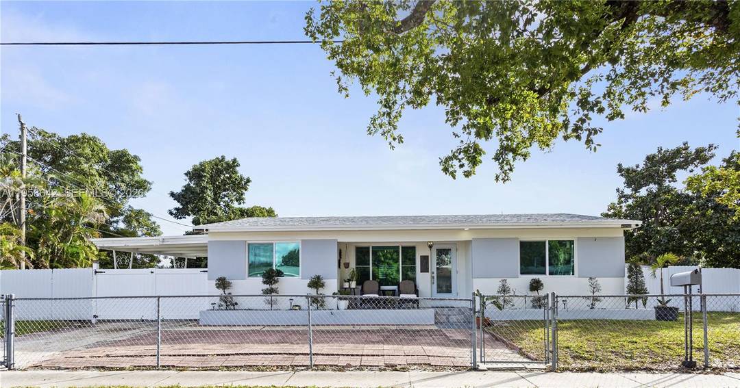 Updated 3 bedroom, 2 bath corner lot home featuring a brand new 2025 roof and impact windows throughout.