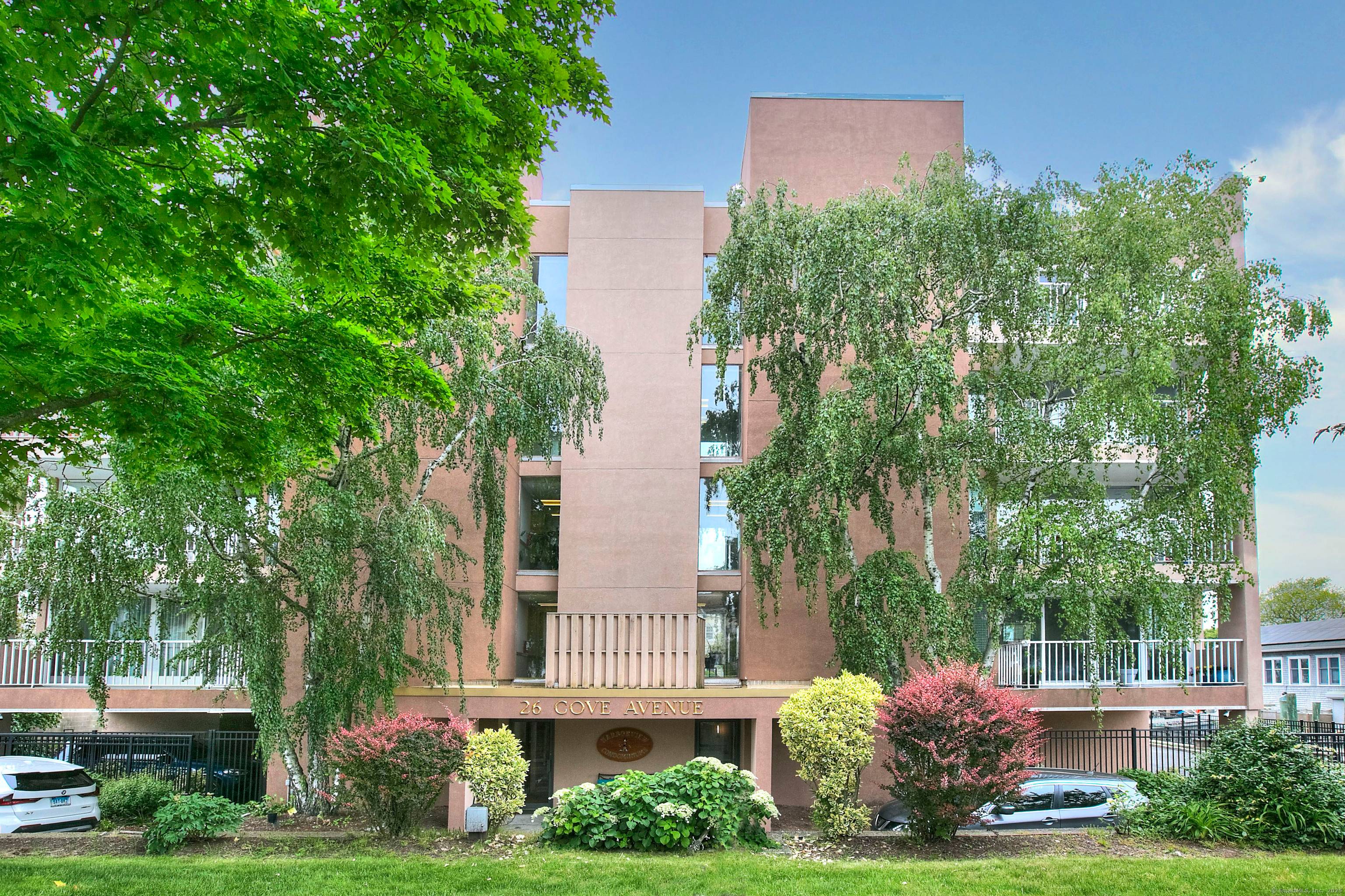 Welcome to your dream home a beautifully appointed, direct waterfront ranch style condo with sweeping views of the picturesque Norwalk Harbor.