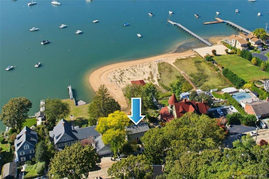 Experience year round waterfront living in the heart of Northport Village with this 3 bedroom, 3 bath harborfront home thoughtfully updated to blend coastal comfort with modern convenience.