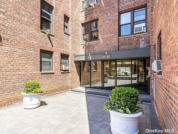 Well maintained large one bedroom co op apartment currently used as a two bedroom located above ground floor and facing the front of the building.