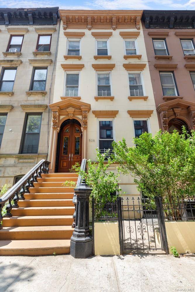 526 CARLTON AVE is a beautifully preserved 5 bedroom, 2 full, 2 half bath, 3600 sf limestone townhouse build in 1877, Landmarks Preservation, said best preserved house on the block.