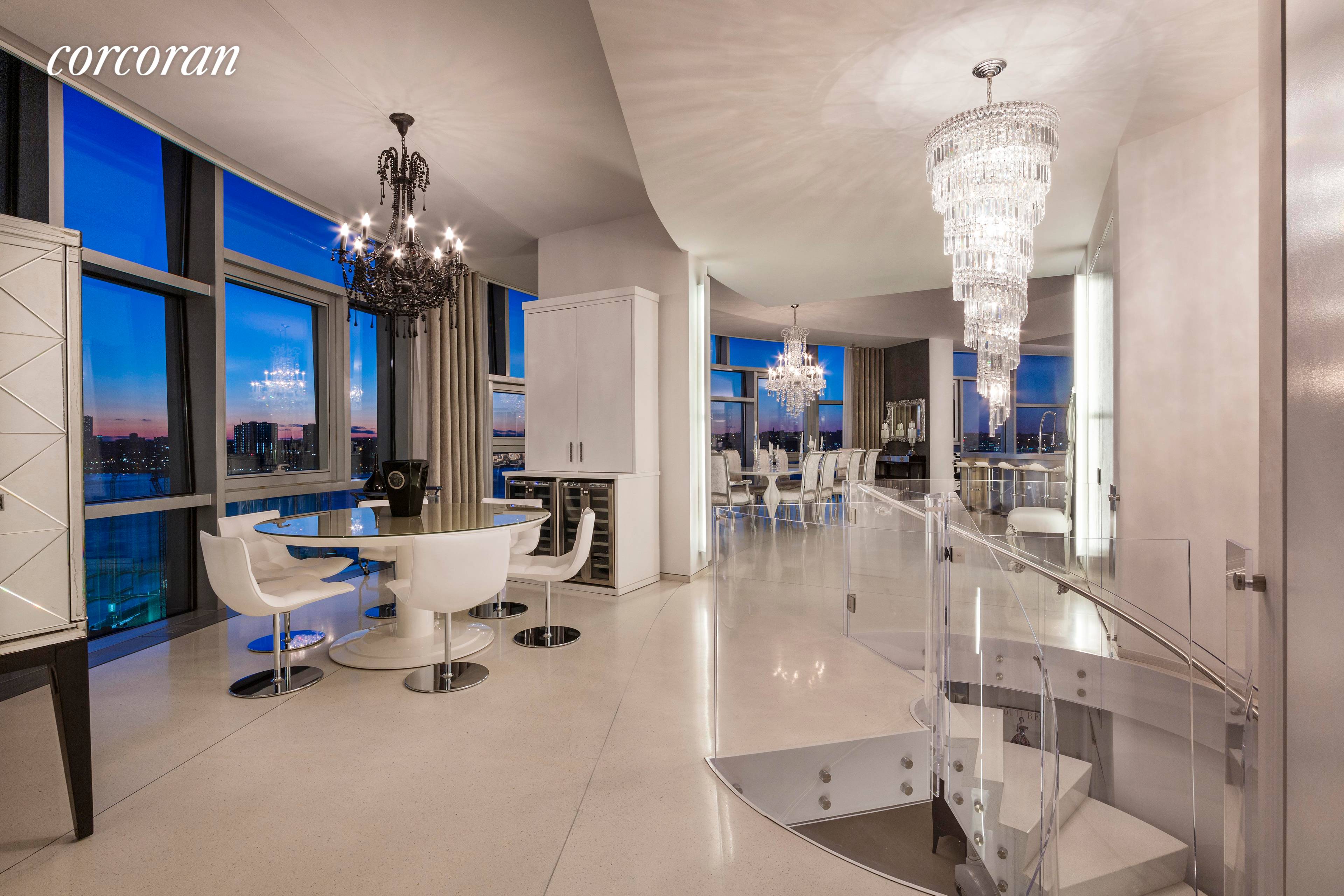 From the impeccable lobby at 100 11th Avenue, the elevator opens into your own 18th floor of this exquisite duplex.