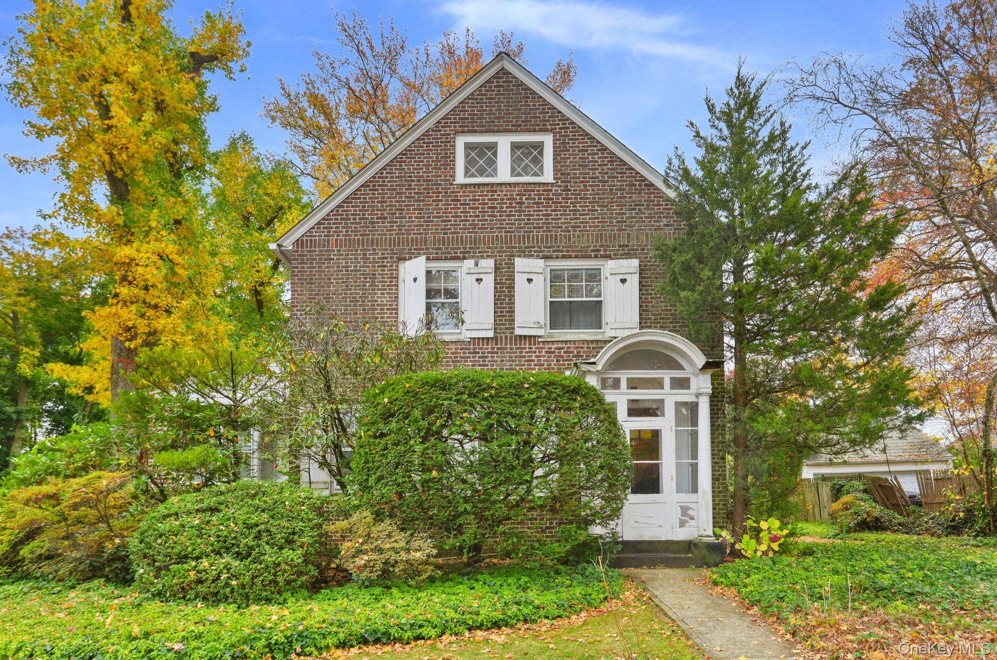 Charming Brick Home on a Quiet Residential Street !