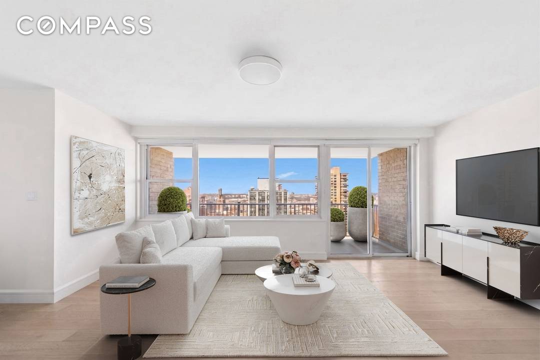 Perched high above the Upper West Side, this beautifully renovated two bedroom, two bath residence is flooded with natural light and framed by expansive open views.