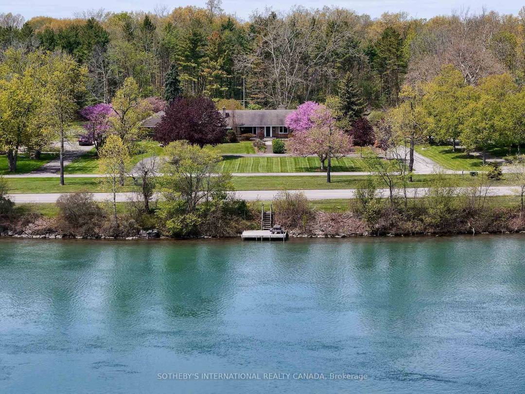 Set Along The Scenic Upper Niagara River Parkway With Picturesque Views Of The Niagara River And Private Dock Access, This Exceptional Property Offers A Rare Combination Of Privacy, Natural Beauty, ...