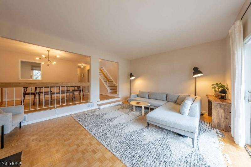 Move in ready townhome with peaceful golf course views and a private setting overlooking Spring Brook Country Club.