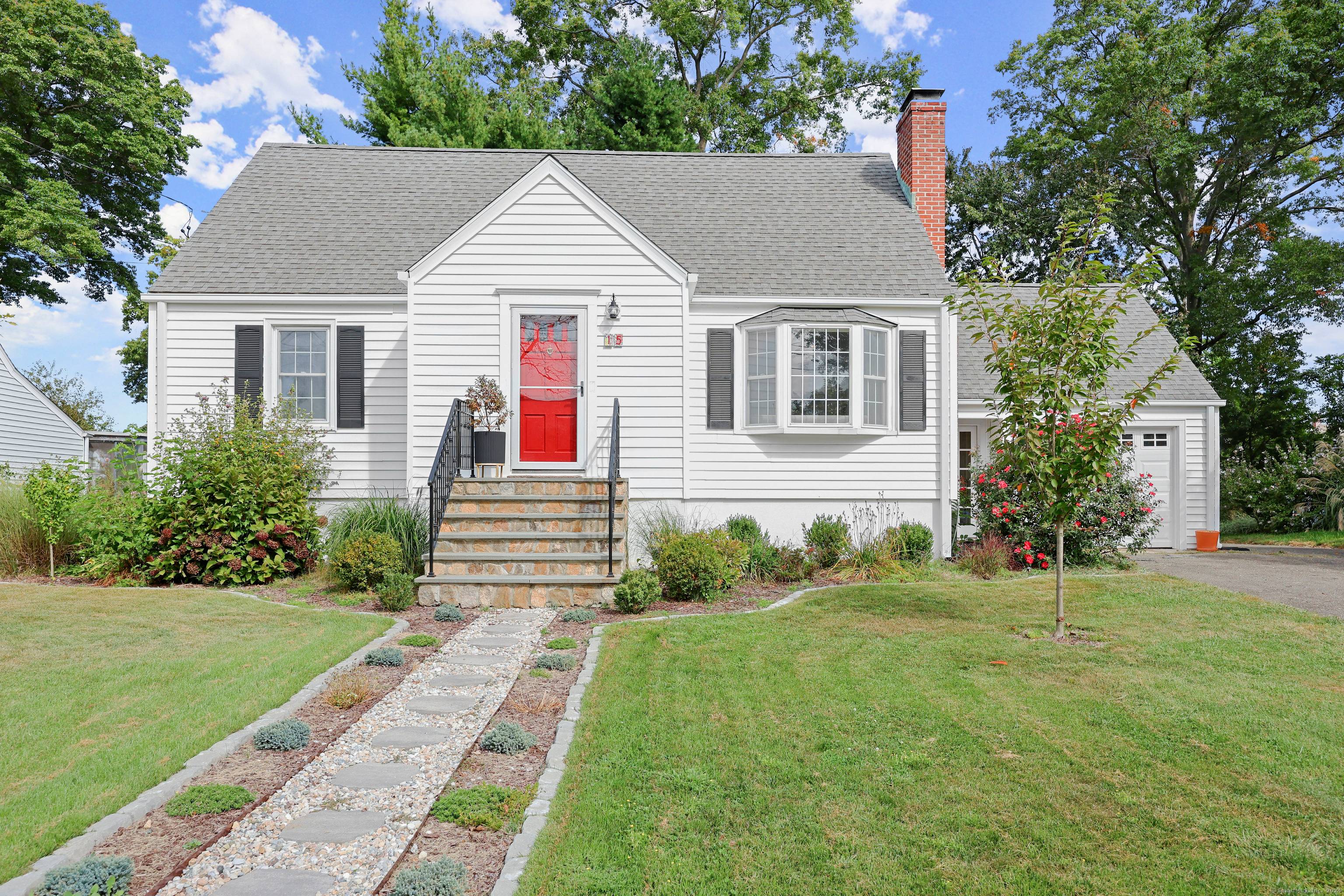 Welcome to this expanded and updated colonial revival cape cod style home, tucked away on a quiet cul de sac, within a charming walkable neighborhood in Norwalk's Bettswood area.