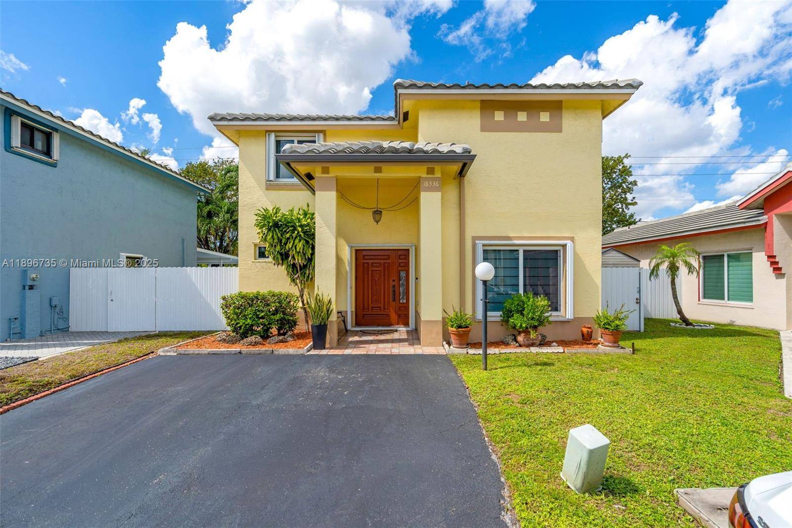 Welcome to your dream home in the gated community of Monterrey, located in Miami Gardens !