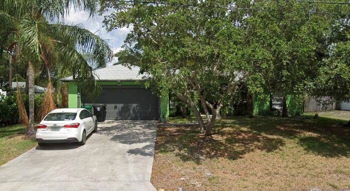 This charming 3 bedroom, 2 bathroom main home with an attached 1 bedroom, 1 bathroom in law suite is located in the heart of Port St.