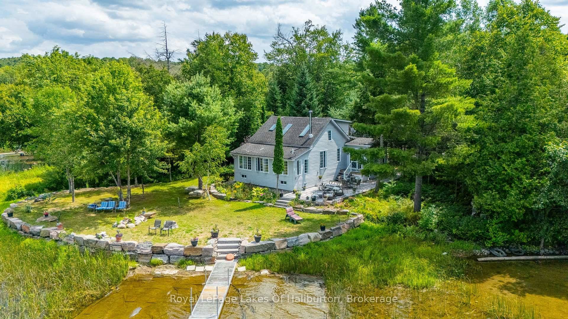 Year round home or cottage on sought after Maple Lake, part of a scenic 3 lake chain.
