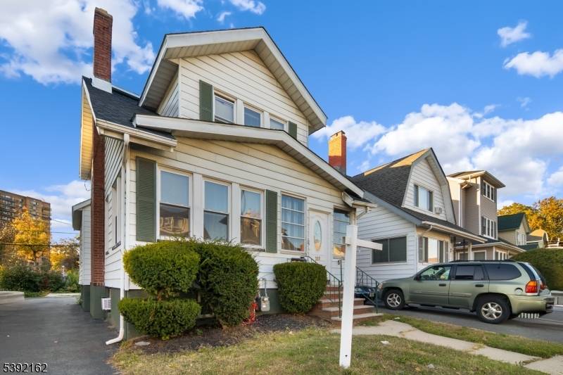 Welcome to this beautifully maintained Colonial home offering timeless character and versatile living space.