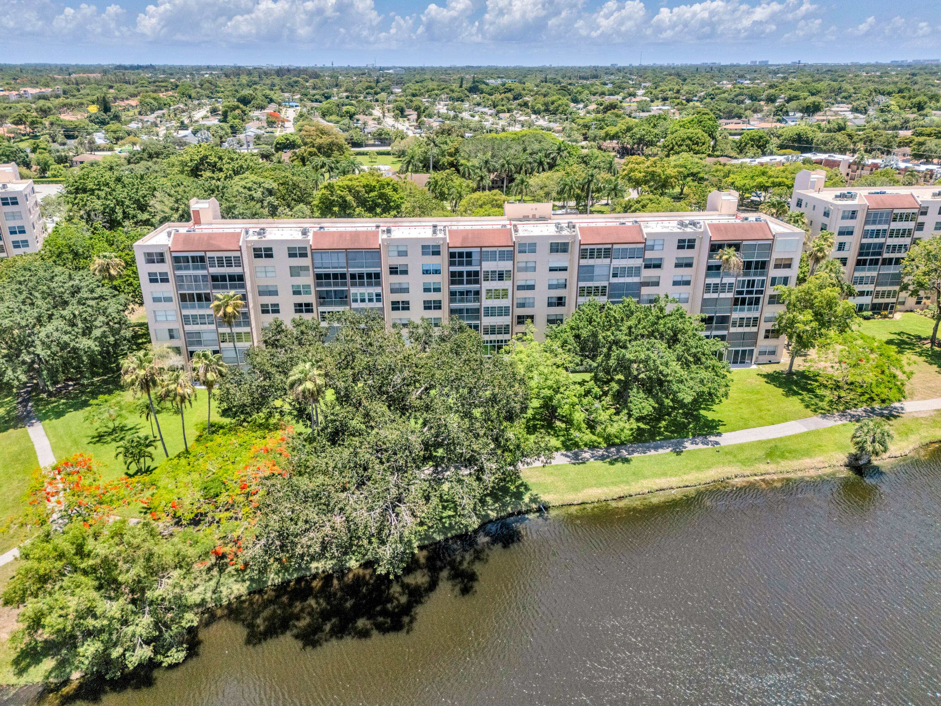 WELCOME HOME TO THIS CHARMING 2 BEDROOM, 2 BATH CONDO WITH SERENE LAKE VIEWS, INCLUDING YOUR PRIMARY BEDROOM.