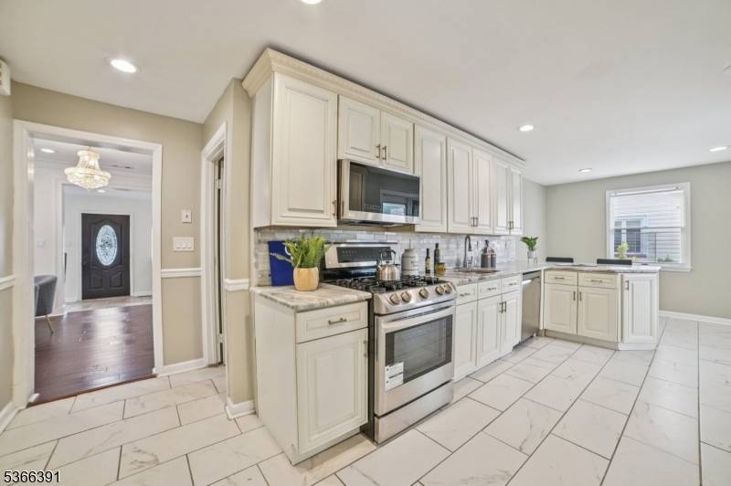 Custom built colonial with 5 bedrooms and 3 full baths.