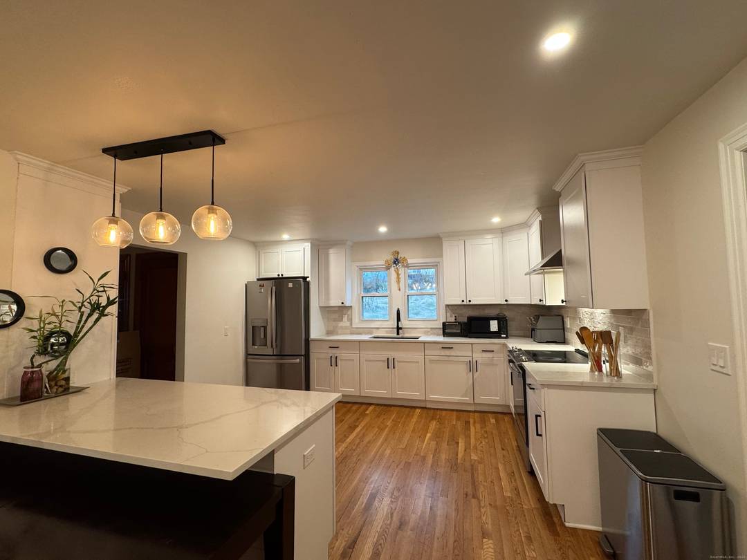 Welcome to this beautifully refreshed Colonial in the heart of Danbury, offering modern finishes and flexible living spaces.