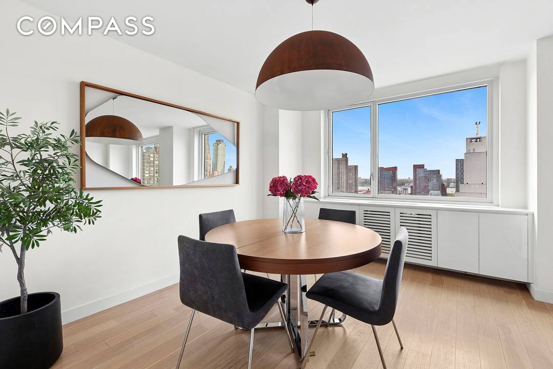Welcome to 301 W 53rd St Unit 18A, a luxurious high floor corner residence in the heart of vibrant Hell s Kitchen.