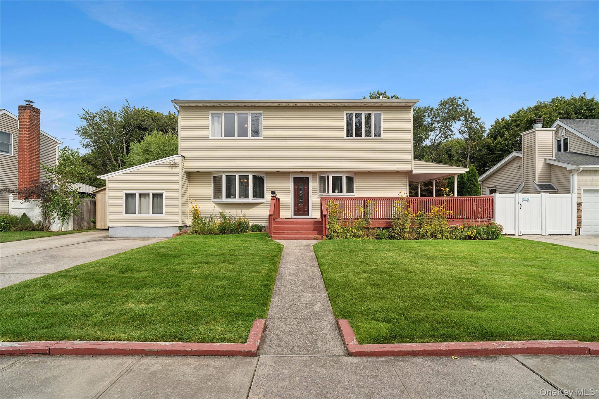 Introducing 79 Elizabeth Ave, Bethpage a spacious and beautifully maintained residence in Plainedge School District.