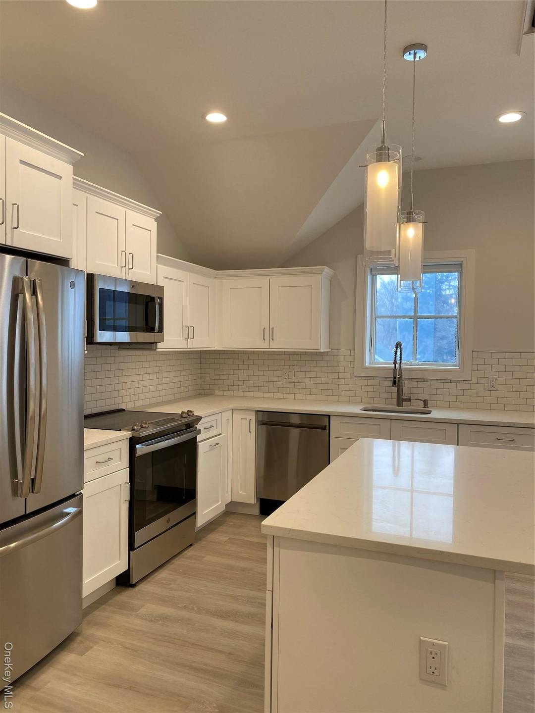 This lovely 2 bedroom, 2 bath end unit offers views of wooded area.