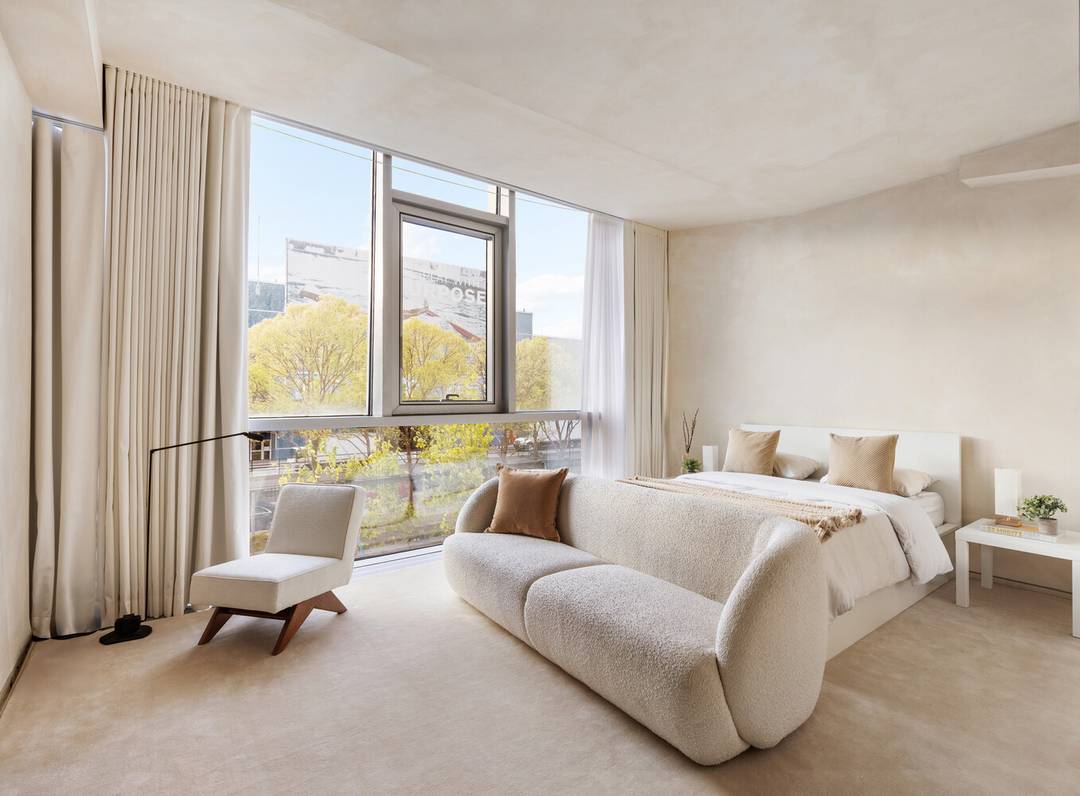 A Stunning Designer Home with 12ft Ceilings and Open Views at Jean Nouvel's Architectural Masterpiece Delivered Fully Furnished.