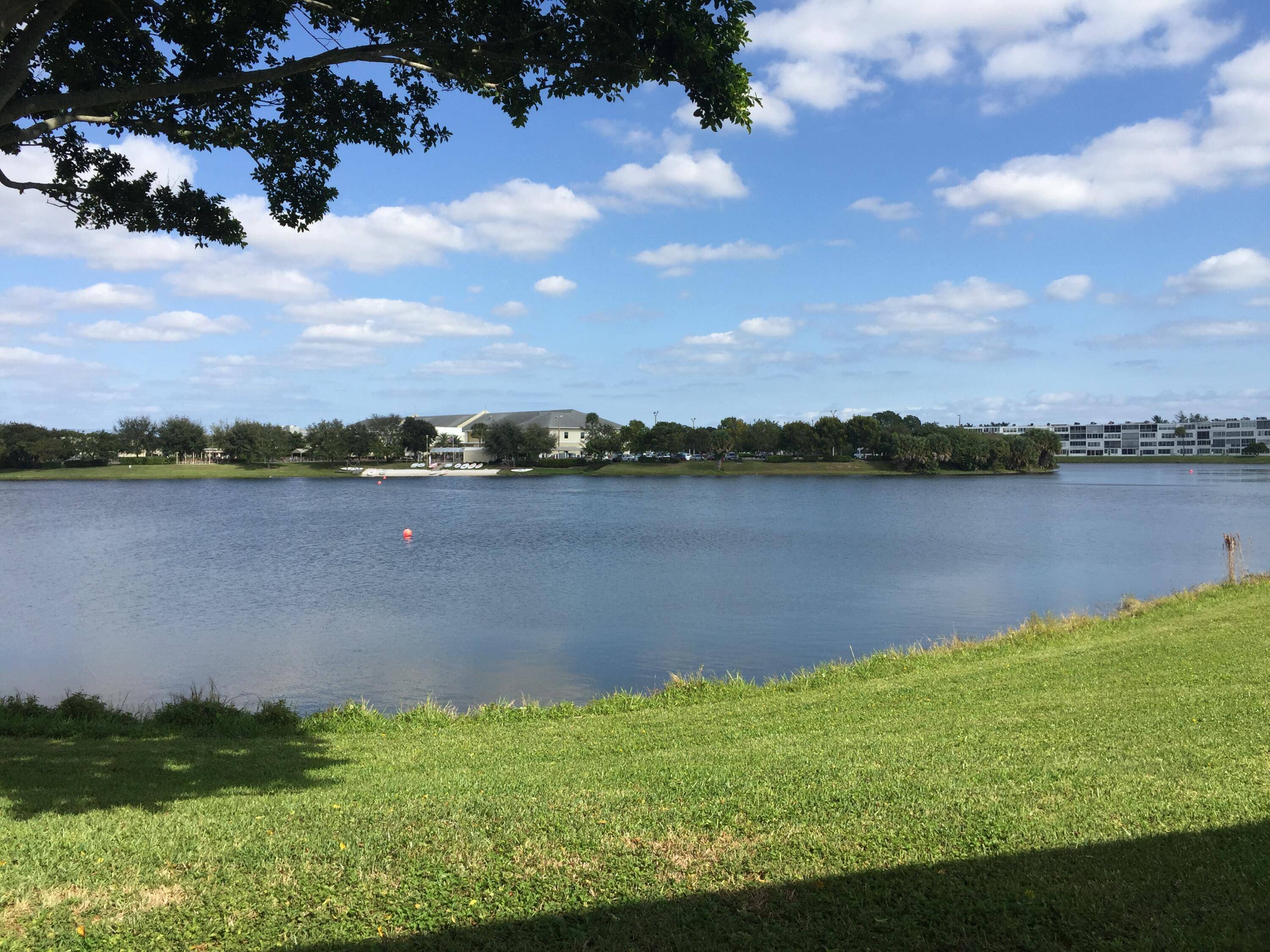 FANTASTIC LAKE VIEW from this very spacious 2 bedroom 2 full bath PENTHOUSE unit on 3rd floor of a 3 story elevator building in the most sought after WELLINGTON Community, ...