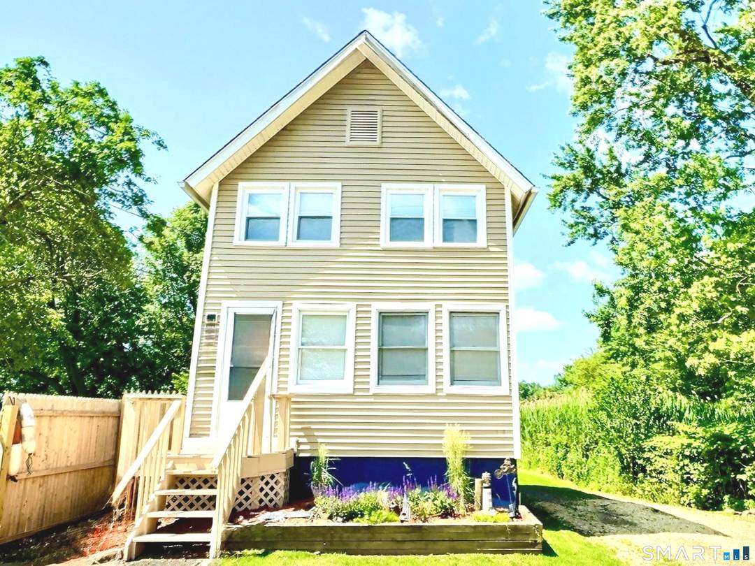 Welcome to Surf Ave a turnkey coastal home offering classic beach charm and modern comfort in the heart of Milford.