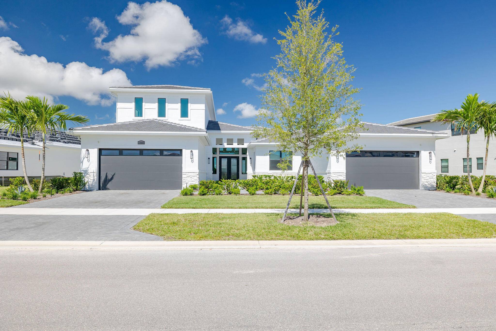 Discover upscale lakefront living with serene Astor Creek Golf Course views in this stunning 5 bedroom, 5.