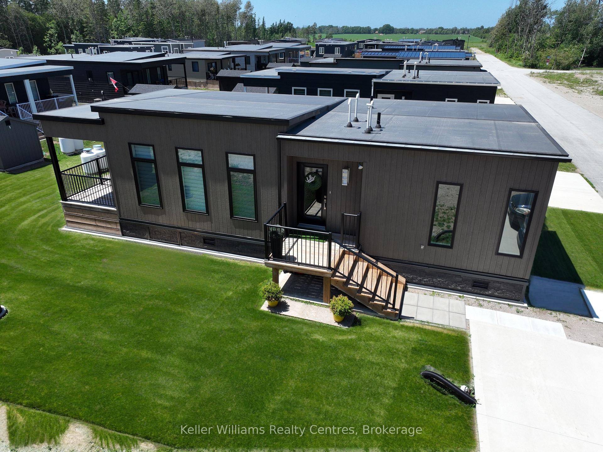 Nestled in the heart of charming Port Elgin, this stunning 2023 Ashfield model, built by Conquest, is a rare find at Port Elgin Estates, perfect for year round living or ...