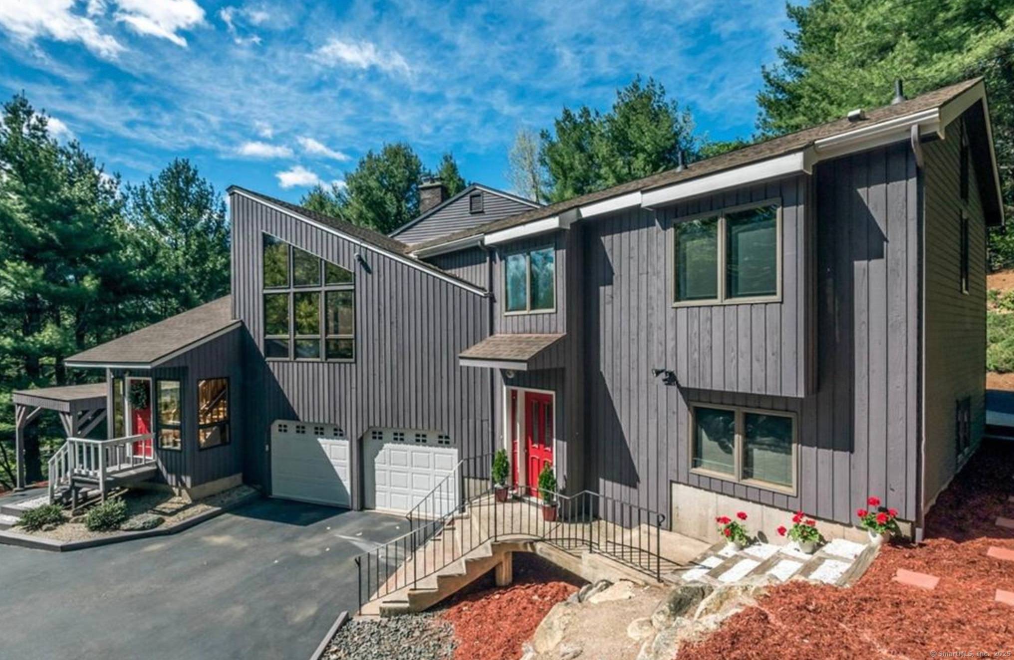 There is plenty of room for everyone in this stunning 4, 000 square foot, five bedroom, four and a half bath contemporary style home !