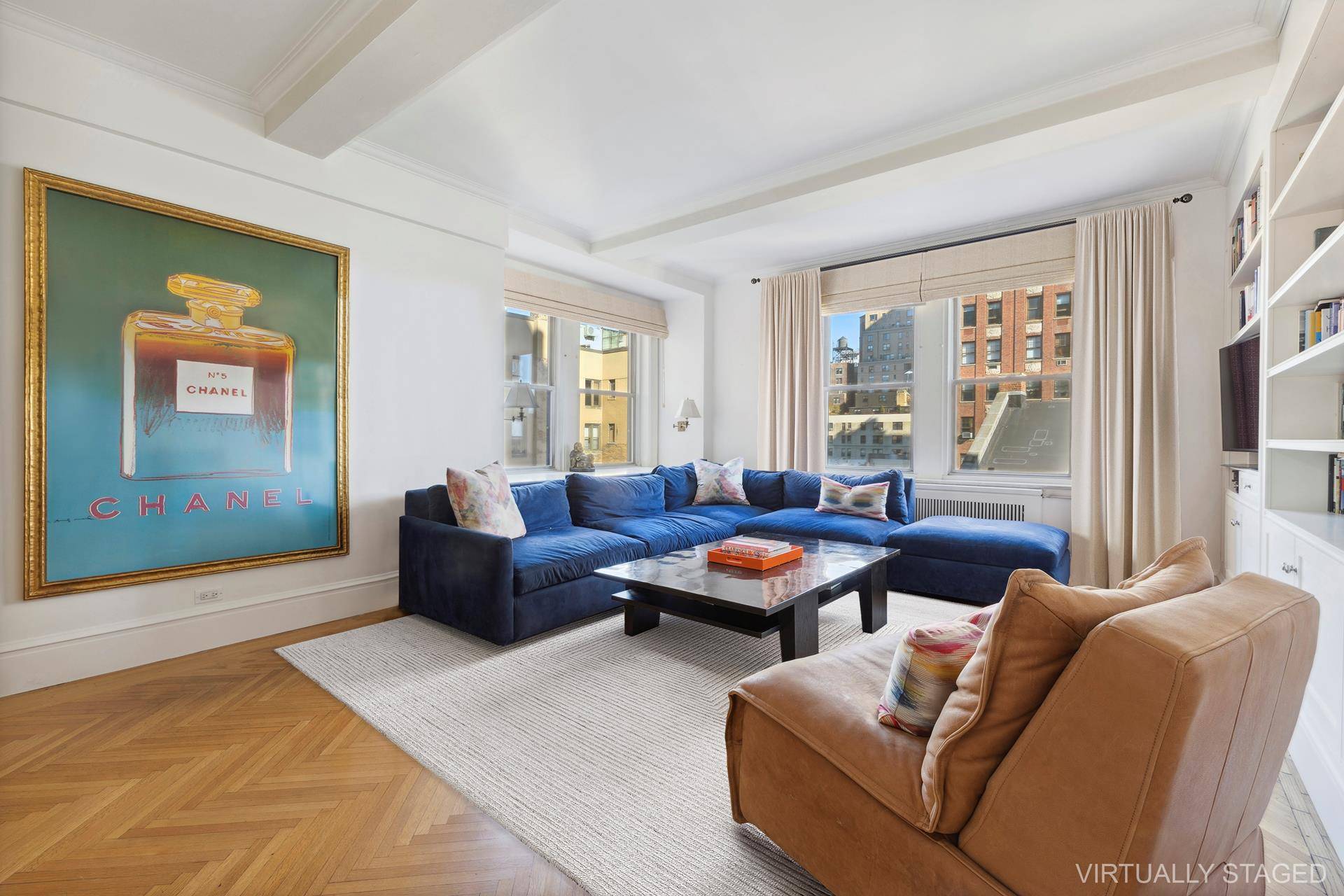 A gracious two bedroom, two bathroom home above Central Park that exemplifies classic pre war Central Park West living.