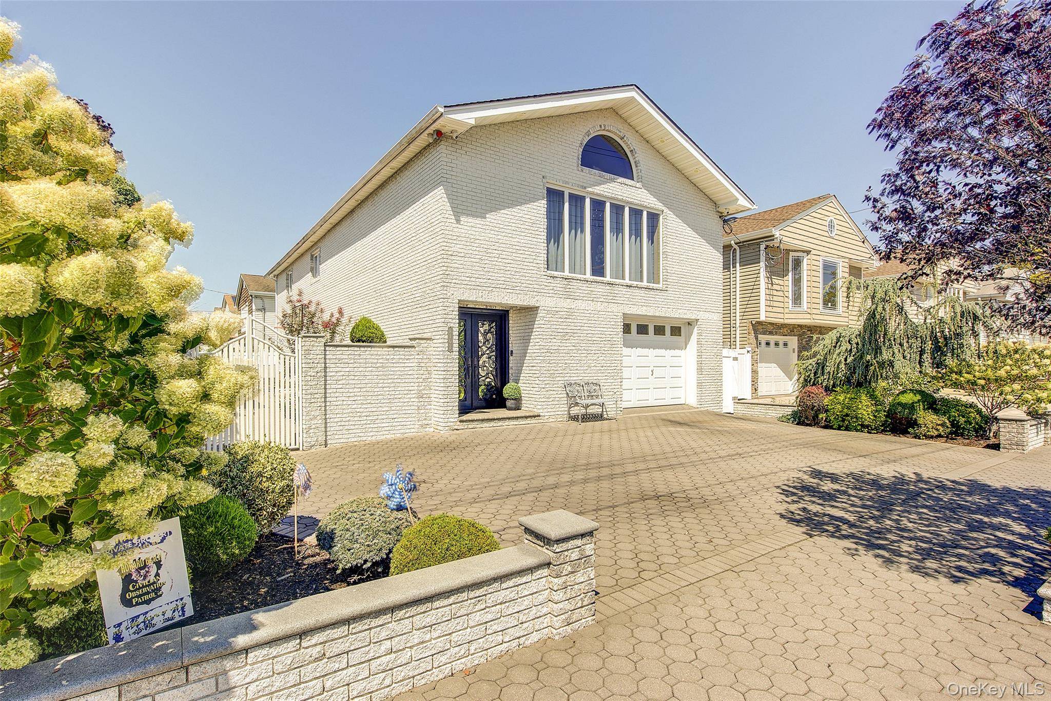 Stunning Corner Lot Single Family Home.