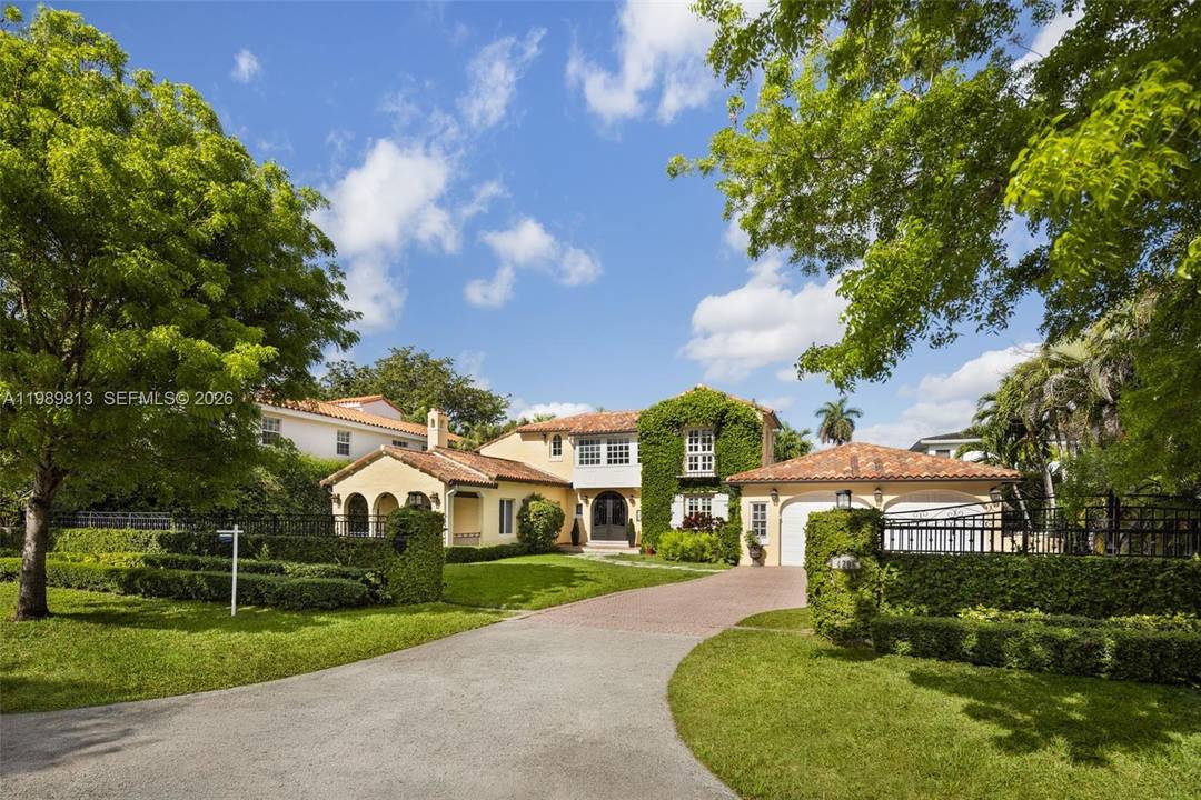 A timeless 1926 Spanish style residence in the prestigious Coral Gables Country Club section, blending historic character with refined modern living.