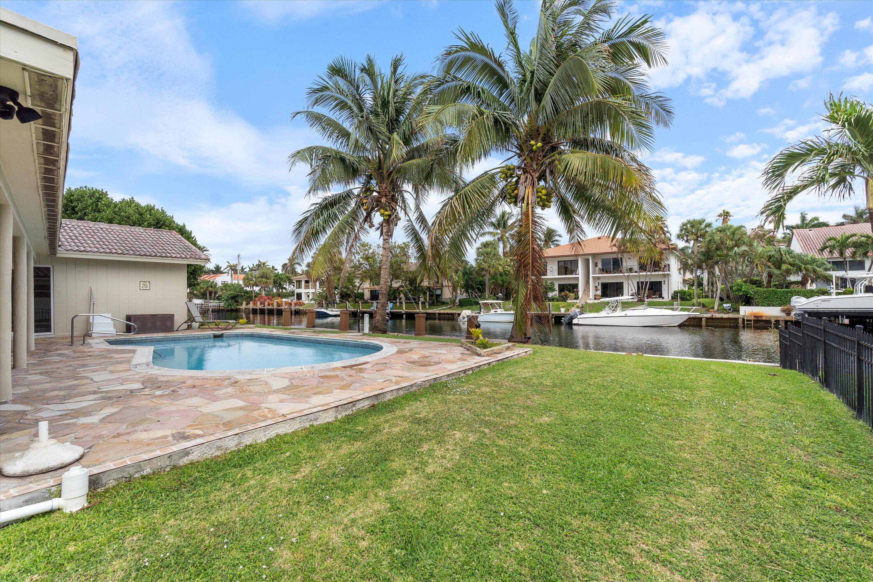 Waterfront Paradise in Prestigious Highland BeachWelcome to 4315 Tranquility Drive an updated coastal retreat in the sought after Bel Lido Isle community.