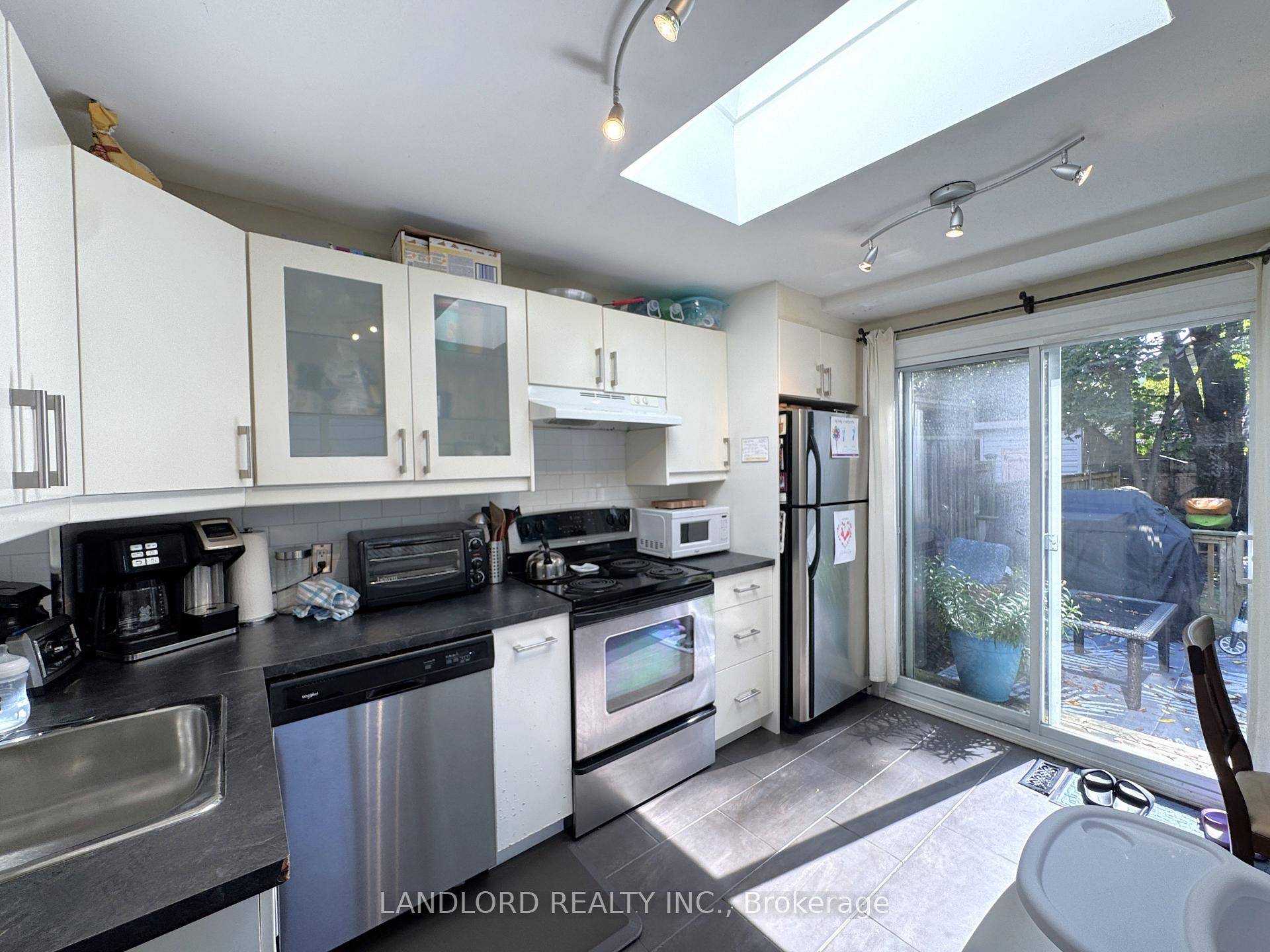 Professionally Managed 2 Bed, 1 Bath Home Featuring A Modern Kitchen Complete With Stainless Steel Appliances And Walkout To A Deck And Private Yard, Perfect For Entertaining.