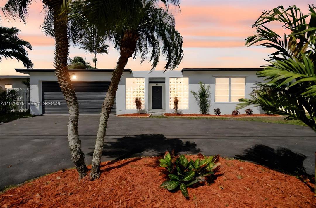 Beautifully updated one story 3 bedroom, 2 bath pool home with a fully functional 2 car garage, circular driveway, and BRAND NEW ROOF in the heart of Sunrise !