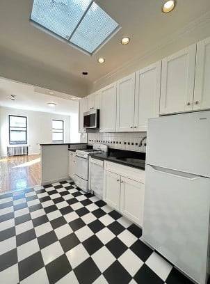 Available by May 6th. Spacious 1 Bedroom on Full Floor of Upper East Side Brownstone.