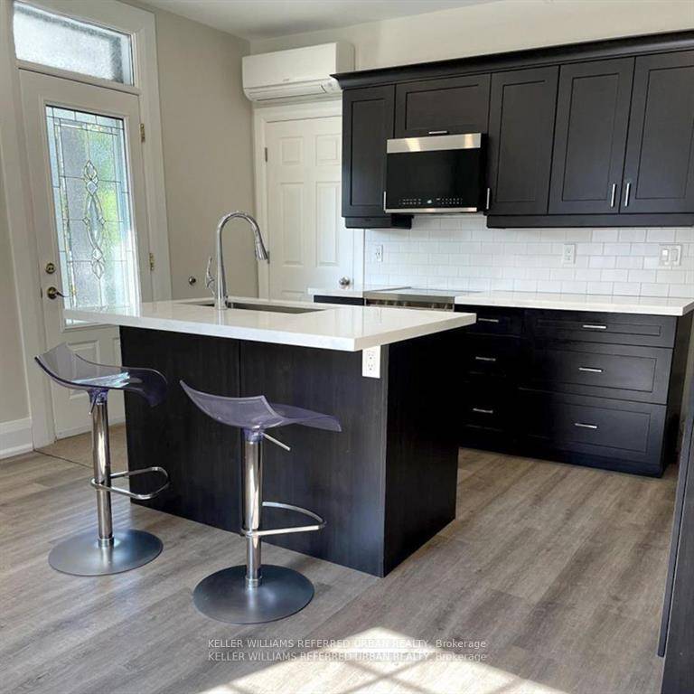 Stunning, Light Filled Two Storey Apartment in the Heart of Aurora !