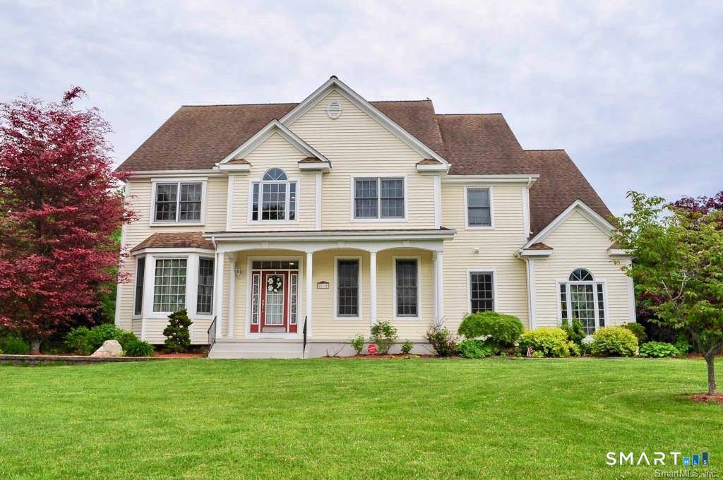 Beautiful colonial with open front porch located in the sought after Deming Estates subdivision.