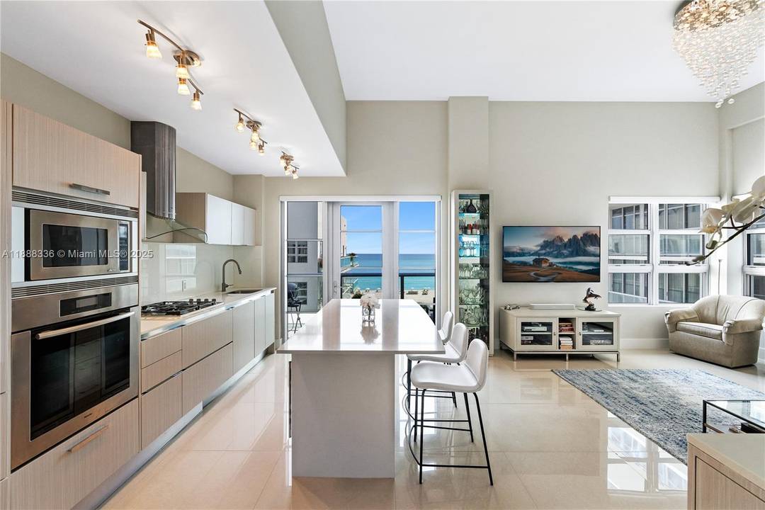 Discover the pinnacle of oceanfront living in Penthouse N 605 at The Caribbean.