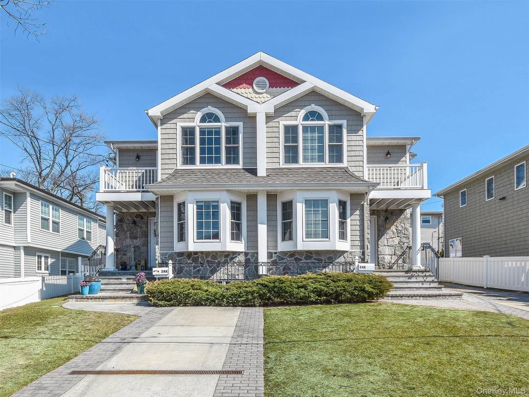Waterviews of Manhasset Bay from this spacious Duplex featuring living room, dining room, and eat in kitchen w granite counters, SS appliances amp ; sliders to backyard.