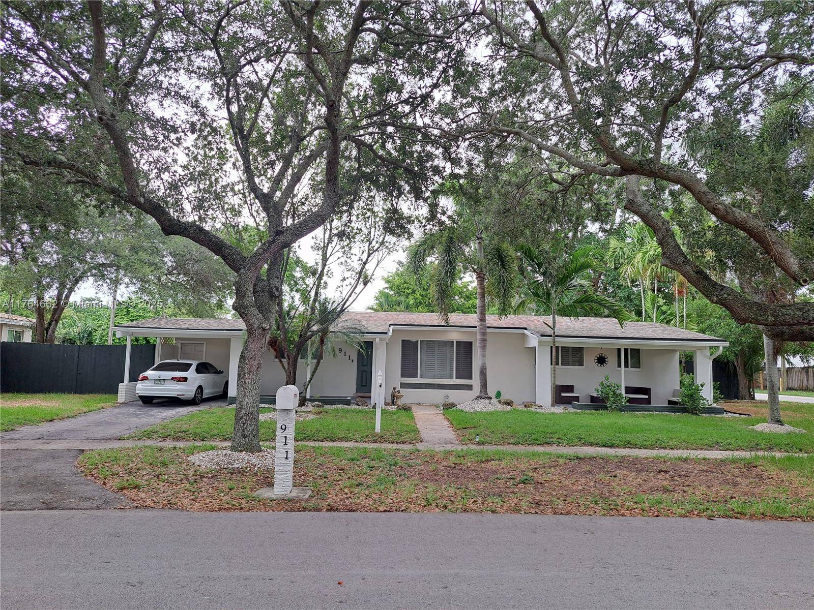 Lovely home in Lauderdale Golf Estates in the City of Plantation with unobstructed views of Fort Lauderdale Country Club Golf Course.