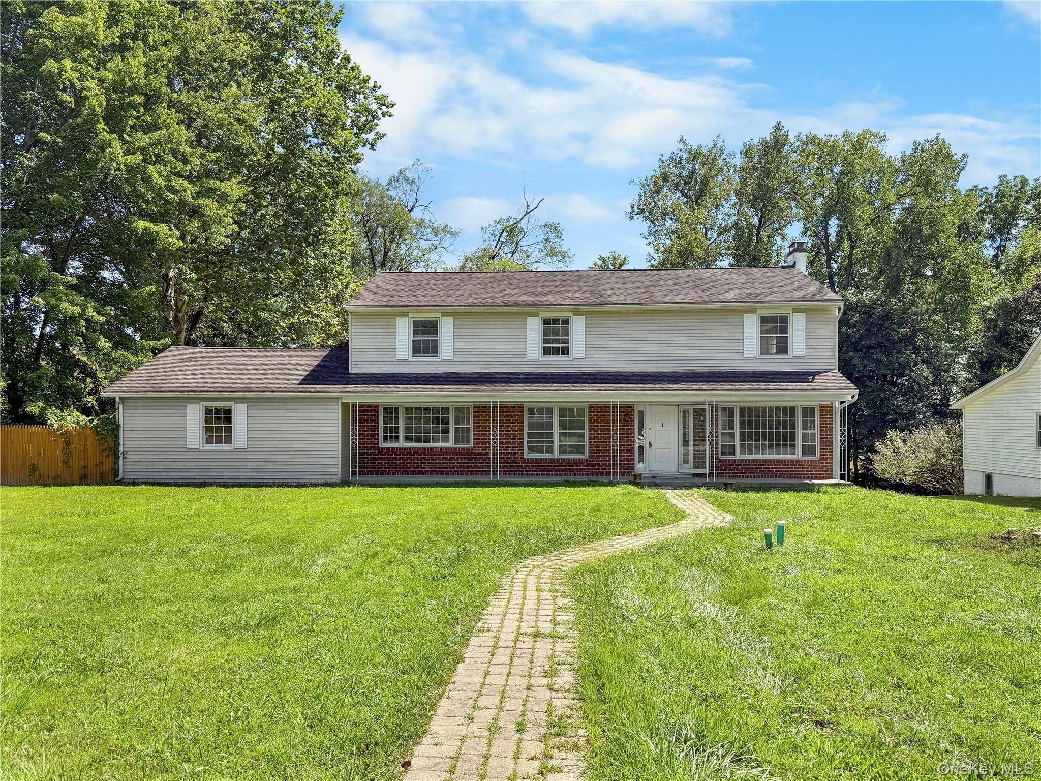 Located on a quiet corner lot in the desirable Spackenkill School District, this 5 bedroom, 2.