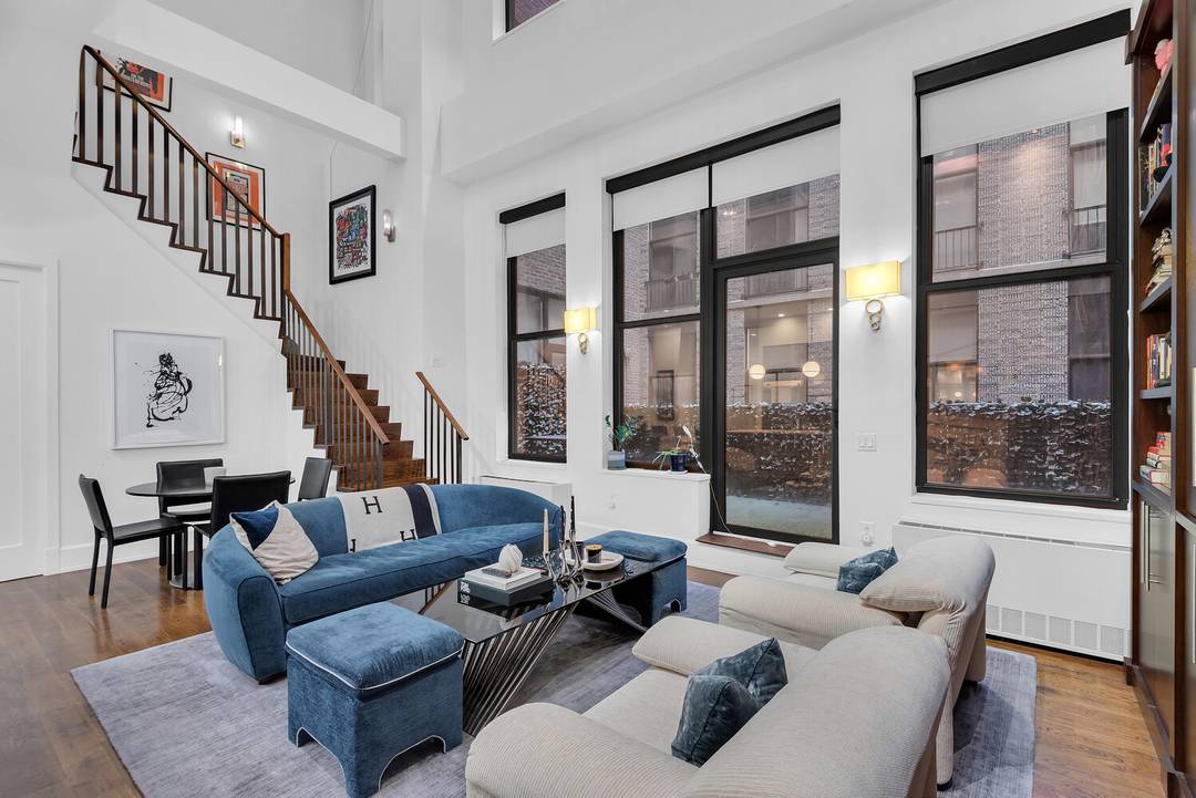 A rare and dramatic duplex loft in one of Flatiron's most sought after full service condominiums.