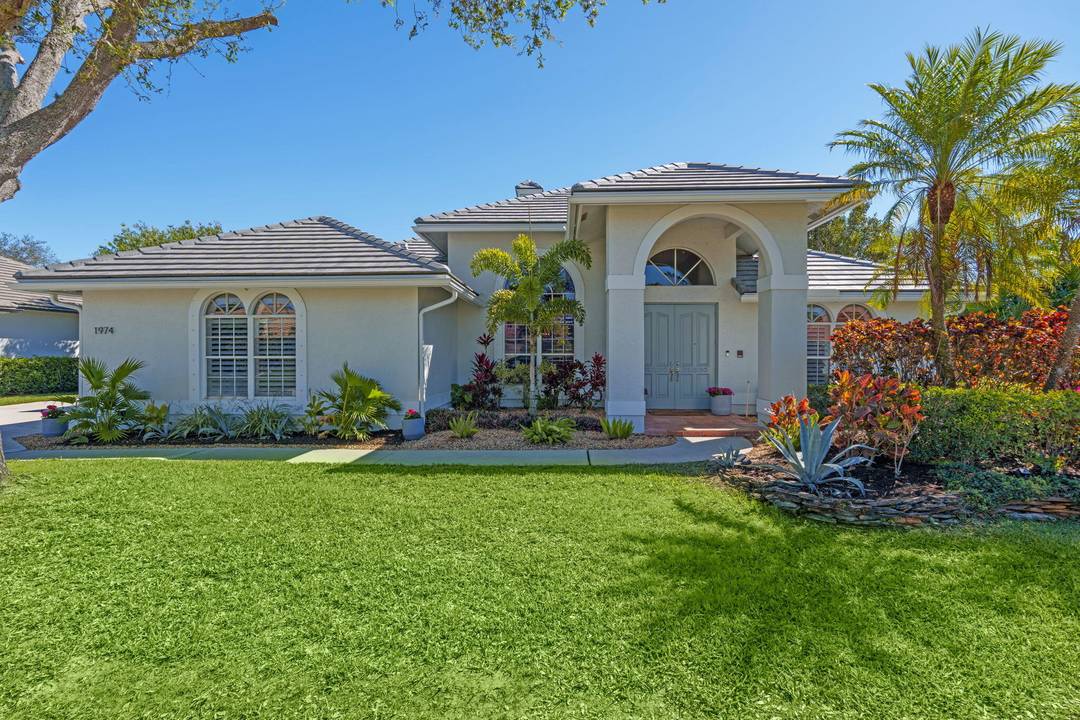 Set on the fairways of Wanderers Golf Course, this beautifully updated 4 bedroom, 3 bath residence combines elegance, comfort, and entertaining appeal.