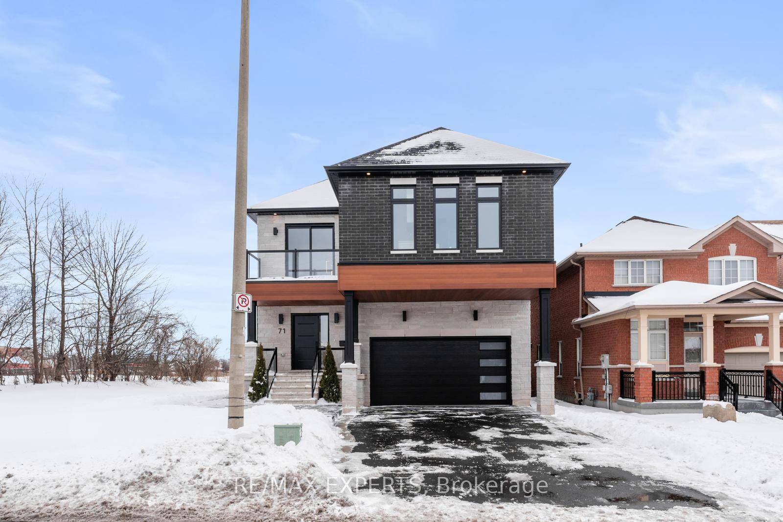 Welcome to 71 Hawkview Blvd, a stunning custom built 4 bedroom, 4 bathroom home nestled on a ravine lot with no sidewalks.