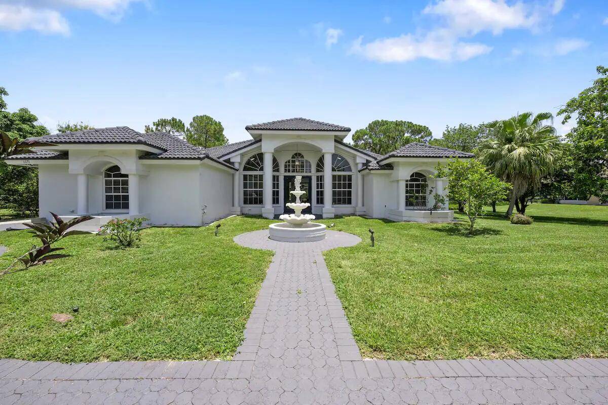 WOW ! ! Stunning 4 bedroom 2 bath with private screened in pool on a 1.