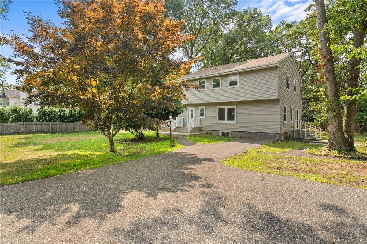 Welcome to this classic colonial style single family home in the top rated Three Village School District in Stony Brook.