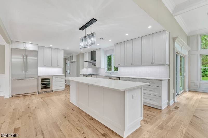 Simply stunning and Completely rebuilt in 2024, this unmatched 6 bedroom, 4.