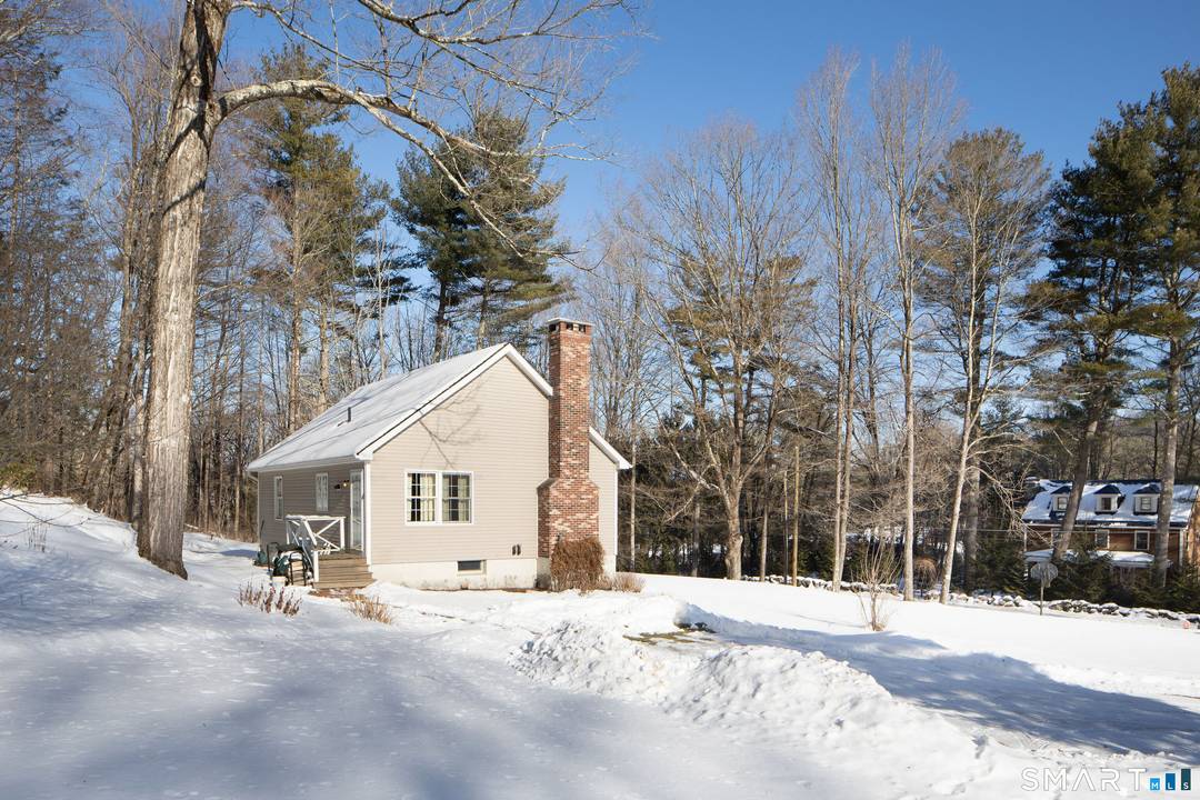 This charming, bright, and well maintained home offers comfortable one level living with two bedrooms and one bath, set on two acres in a peaceful, partially wooded setting that abuts ...